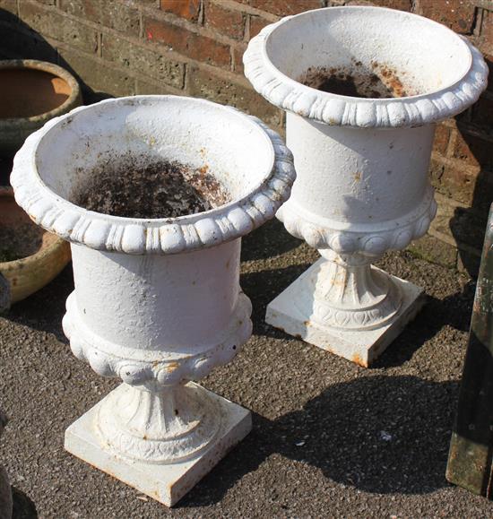 Pair iron urns